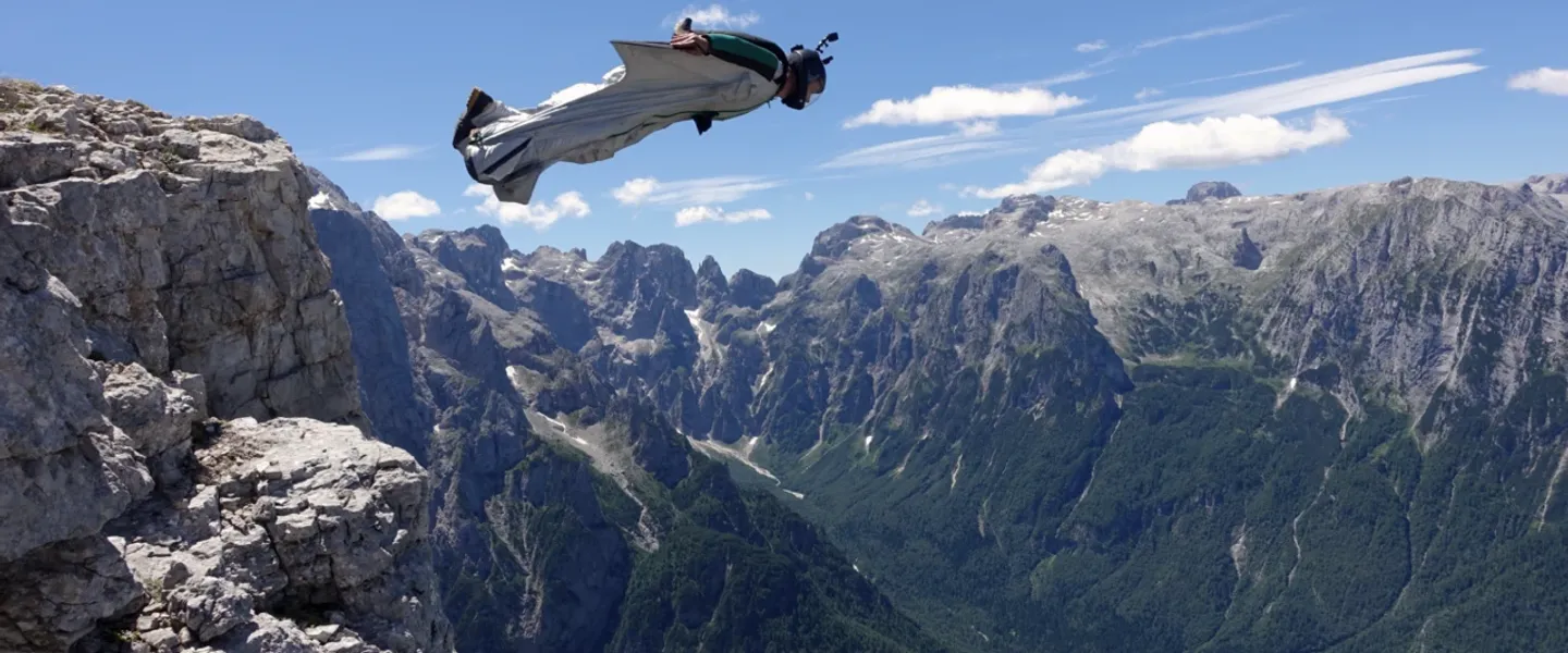 Experience the thrill of wingsuit flying! 🪂 Discover the adrenaline, technique, and breathtaking views that await you. 🌍✨ #WingsuitFlying #Adventure